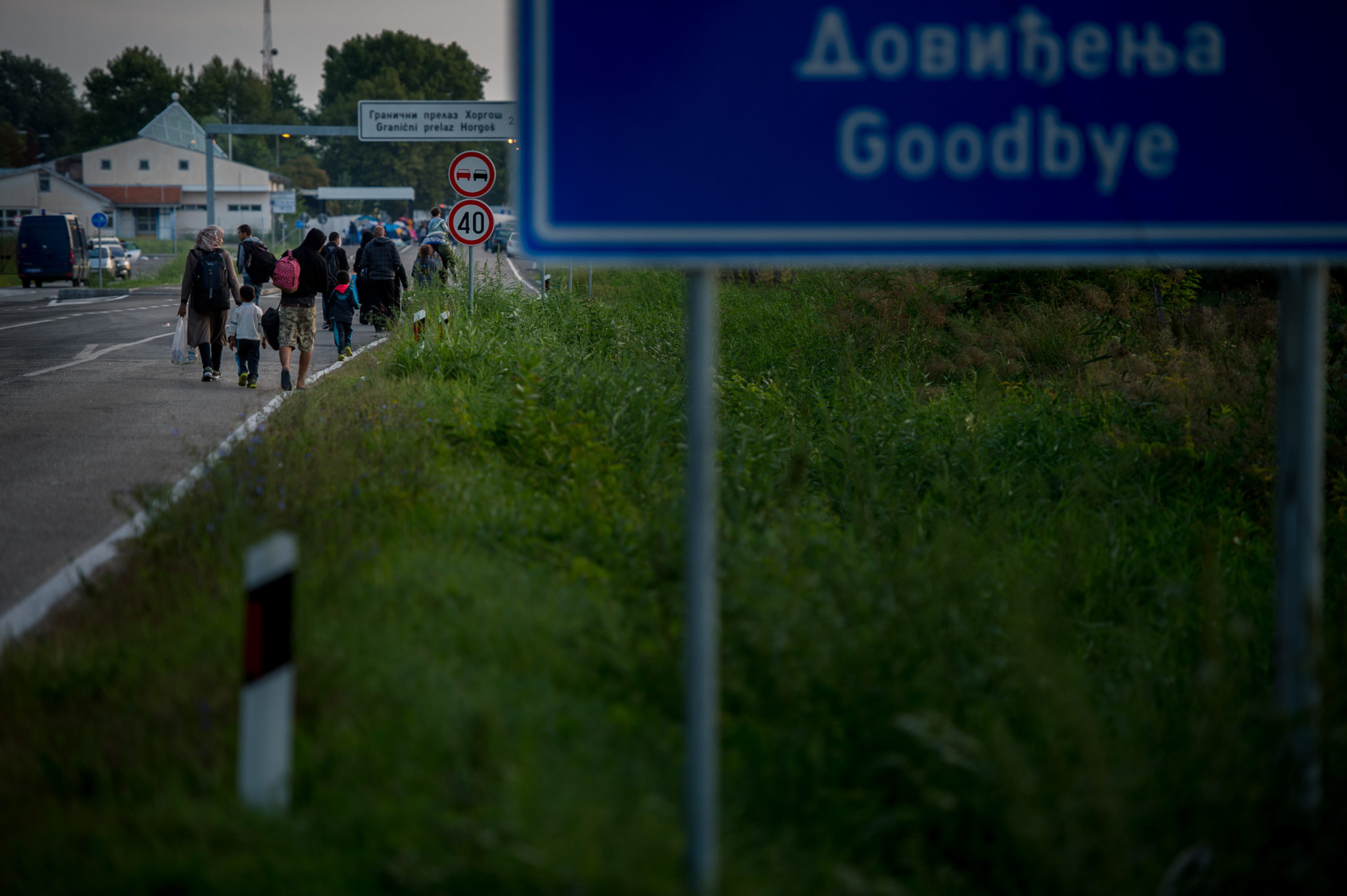 Migránsok a röszkei határátkelőhelynél Horgos Közelében 2015. szeptember 15-én.